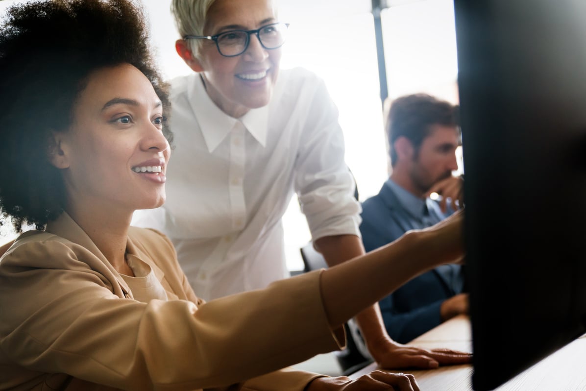 Creative people working in office on computer